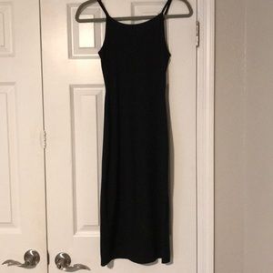 Skinny knee-length tight black dress